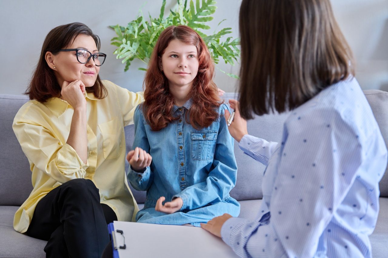 Therapist meeting with mother and daughter
