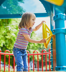 Girl playing in a playground